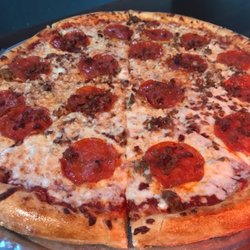 Contender's Pizzeria and Arcade - Meat Lovers - Large.