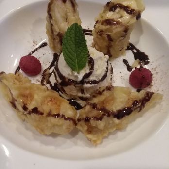 Sushi Cafe - Banana Tempura for desert was awesome, and I highly recommend it. Top right is a fried, sunglasses wearing, happy banana. - Sushi Bars Near Me - Ocean City, Maryland Sushi Cafe - Banana Tempura for desert was awesome, and I highly recommend it. Top right is a fried, sunglasses wearing, happy banana. - Sushi Bars Near Me - Ocean City, Maryland