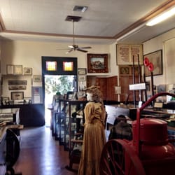 Port Hueneme Historical Society Museum - Interior of Museum looking toward front door.  Notice stained glass over transom.