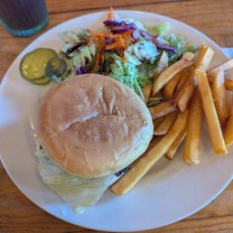 "Garden Burger" (Impossible patty) burger with the fries & salad upgrade, and vinaigrette. "Garden Burger" (Impossible patty) burger with the fries & salad upgrade, and vinaigrette.