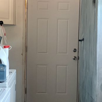 Miles Home Improvement - Laundry room door not installed properly no shim nothing holding door on floor opening not completed - Roofing Near Me - Boyce, Louisiana