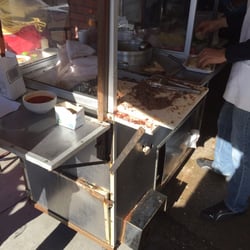 Taqueria - The cook prepping the delicious meat