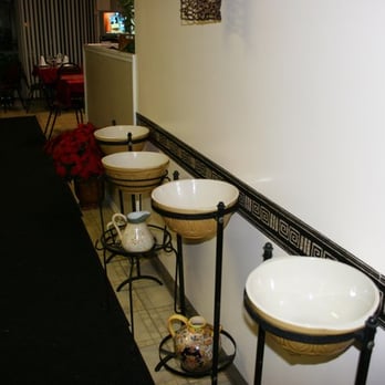 Drelyse African Restaurant - traditional style hand washing bowls at Drelyse - African Near Me - Columbus, Ohio