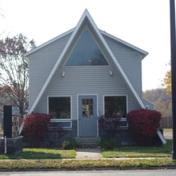 Feminique That Hair Place - The little A-frame house on Lincoln Way East