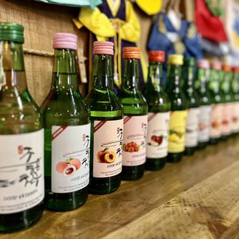 Yum Korea - a row of bottles on a shelf - Korean Near Me - Weston, Florida Yum Korea - a row of bottles on a shelf - Korean Near Me - Weston, Florida