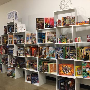 Tabletop Game Cafe - The Great Wall of Games...to choose from! - Coffee & Tea Near Me - Columbus, Ohio