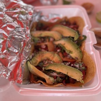 Tacos Vitali - a plate of tacos with avocado - Mexican Near Me - San Antonio, Texas Tacos Vitali - a plate of tacos with avocado - Mexican Near Me - San Antonio, Texas