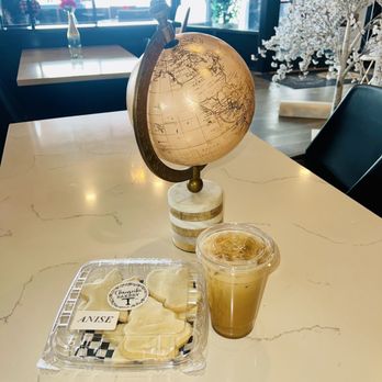 Chrusciki Bakery - Anise cutout cookies so cute and caramel cinnamon roll iced latte with oat milk - Bakeries Near Me - Depew, New York