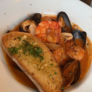Trattoria Amici - Cioppino 29.50 Traditional Italian seafood soup with calamari, shrimp, mussels, clams, and stringbeans in a light tomato broth - Italian Near Me - Glendale, California Trattoria Amici - Cioppino 29.50 Traditional Italian seafood soup with calamari, shrimp, mussels, clams, and stringbeans in a light tomato broth - Italian Near Me - Glendale, California