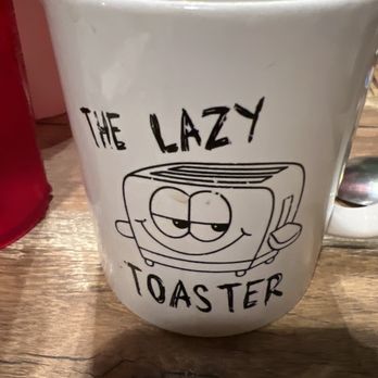 The Lazy Toaster - Cute coffee mug - Breakfast & Brunch Near Me - East Tawas, Michigan The Lazy Toaster - Cute coffee mug - Breakfast & Brunch Near Me - East Tawas, Michigan