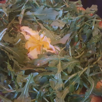 The Flying Goat - An egg smack dab in the middle of this gorgeous arugula that has been tossed in truffle oil. To die for...seriously - Gastropubs Near Me - Spokane, Washington The Flying Goat - An egg smack dab in the middle of this gorgeous arugula that has been tossed in truffle oil. To die for...seriously - Gastropubs Near Me - Spokane, Washington
