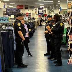 The Uniform Superstore - Manager eventually coming to tell security that corporate has video...