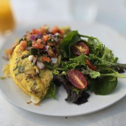 Seafood omelet and side salad Seafood omelet and side salad