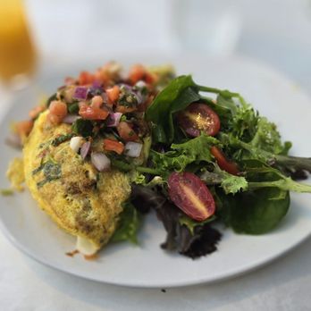 Suite Food Lounge - Seafood omelet and side salad - New American Near Me - Atlanta, Georgia Suite Food Lounge - Seafood omelet and side salad - New American Near Me - Atlanta, Georgia