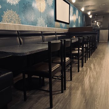 Pho Mimosa - a row of tables in a restaurant - Vietnamese Near Me - Vancouver, British Columbia