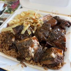 Jerk Chicken, rice and peas, cabbage