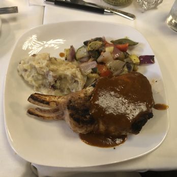 Stevens' - Delicious double cut bone-in pork chop dinner entree. - American Near Me - Gurnee, Illinois