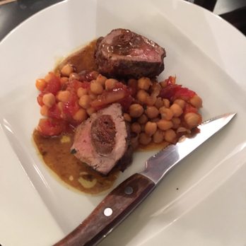 hOST Restaurant - Pork loin with tomatoes and chick peas - Modern European Near Me - Prague, Puerto Rico