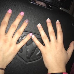 Nail Palace - My friend and I both got our nails done. The French tip is a shellac and then the other one acrylics.