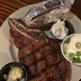 El Corral - Ribeye with baked potato and horseradish - Steakhouses Near Me - Tucson, Arizona El Corral - Ribeye with baked potato and horseradish - Steakhouses Near Me - Tucson, Arizona