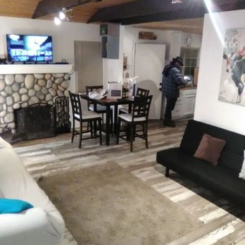 Big Bear Cool Cabins - Living room with spotlights on ceiling - Property Management Near Me - Big Bear Lake, California Big Bear Cool Cabins - Living room with spotlights on ceiling - Property Management Near Me - Big Bear Lake, California
