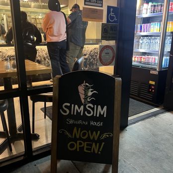 SimSim Shawarma House - Signage at front walking approaching from parking lot - Mediterranean Near Me - Anaheim, California SimSim Shawarma House - Signage at front walking approaching from parking lot - Mediterranean Near Me - Anaheim, California
