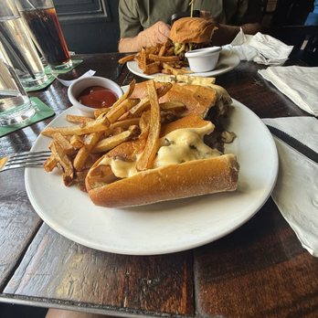 National Mechanics - Ribeye cheesesteak and the Mexican Burger. - Pubs Near Me - Philadelphia, Pennsylvania