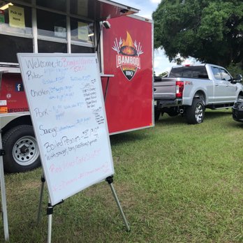 Bamboo Warriors BBQ - a sign in front of a food truck - Barbeque Near Me - Thonotosassa, Florida Bamboo Warriors BBQ - a sign in front of a food truck - Barbeque Near Me - Thonotosassa, Florida