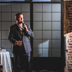 Atlantic Premier Entertainment - One of our excellent entertainers commanding the room!