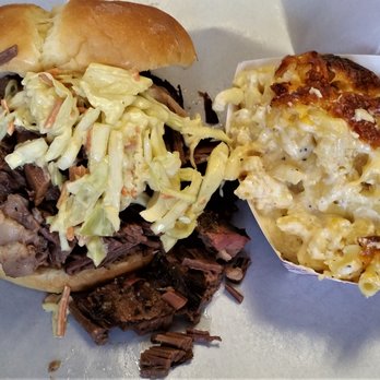 The Memphis King Bbq - Beef Brisket Sandwich topped w/ slaw & BBQ sauce w/ side of Mac & Cheese. - Barbeque Near Me - Schenectady, New York