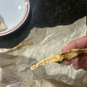 Taco Bell - The skinniest chicken Quesadilla with barely anything in it. - Fast Food Near Me - Port Clinton, Ohio Taco Bell - The skinniest chicken Quesadilla with barely anything in it. - Fast Food Near Me - Port Clinton, Ohio
