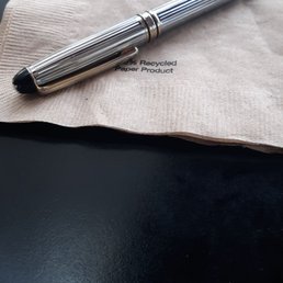 ; ( Terry C. It is not. Should be a metal trim around the flower, no serial #, MB cartridge no fit. But, it sure looks good! ; * ) ; ( Terry C. It is not. Should be a metal trim around the flower, no serial #, MB cartridge no fit. But, it sure looks good! ; * )