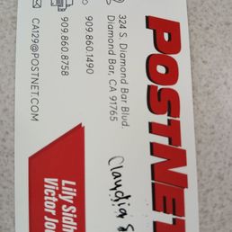 Business card and Claudia S, who assisted me today.