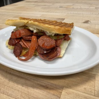 Big Bites - a hot dog on a white plate - Caterers Near Me - San Francisco, California