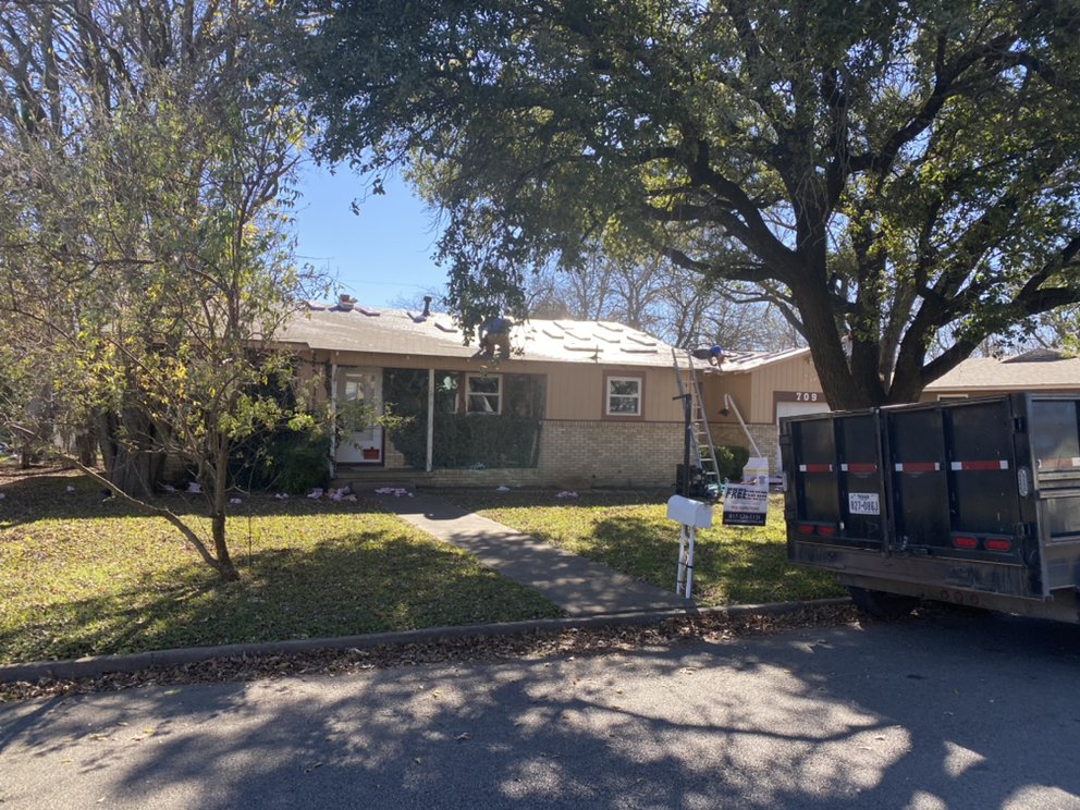 Slide of Freedom Roofing & Construction