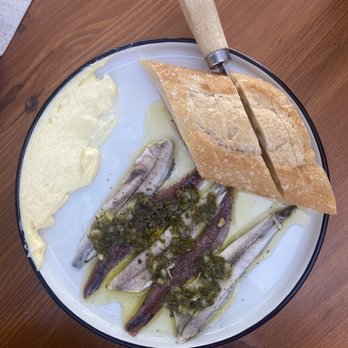 Holiday on 7th - Spanish Anchovies & butter - Cocktail Bars Near Me - Austin, Texas
