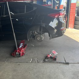Car being worked on Car being worked on