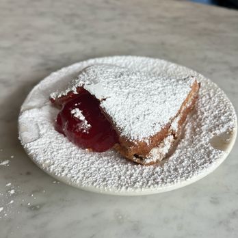 The Vintage - Raspberry-filled Beignet - Wine Bars Near Me - New Orleans, Louisiana The Vintage - Raspberry-filled Beignet - Wine Bars Near Me - New Orleans, Louisiana