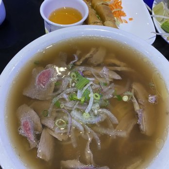Pho Viet Xpress - Raw Beef, Tendon, Brisket Pho XL. With Springrolls in the back. - Vietnamese Near Me - Vaughan, Ontario Pho Viet Xpress - Raw Beef, Tendon, Brisket Pho XL. With Springrolls in the back. - Vietnamese Near Me - Vaughan, Ontario