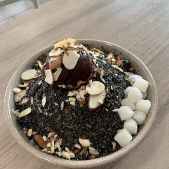 Snow Island - Black sesame shave ice w/azuki beans, mochi bites & sliced almonds. It wasn't super sweet and it has a great nutty taste! - Shaved Ice Near Me - Kailua-Kona, Hawaii Snow Island - Black sesame shave ice w/azuki beans, mochi bites & sliced almonds. It wasn't super sweet and it has a great nutty taste! - Shaved Ice Near Me - Kailua-Kona, Hawaii