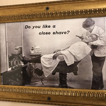 TJ's Cafe - Intimidating bathroom artwork - Breakfast & Brunch Near Me - Grandview, Missouri