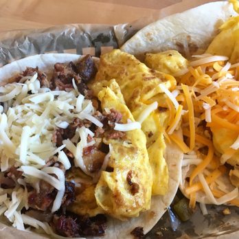 Torchy's Tacos - The Wrangler (left) - amazing! And a #4 breakfast taco (right). - Tex-Mex Near Me - Dallas, Texas Torchy's Tacos - The Wrangler (left) - amazing! And a #4 breakfast taco (right). - Tex-Mex Near Me - Dallas, Texas