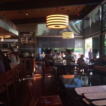 Roaring Fork - Bar area has hightop tables, booths and regular tables. - New American Near Me - Austin, Texas Roaring Fork - Bar area has hightop tables, booths and regular tables. - New American Near Me - Austin, Texas
