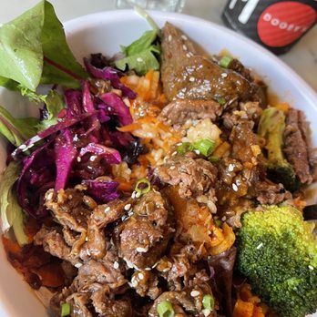 Dooby's - Korean BBQ steak rice bowl with sweet soy ginger sauce. Steak was too sweet, wouldn't order this again. Liked the variety of vegetables. - Coffee & Tea Near Me - Baltimore, Maryland