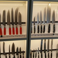Lime and Loaf - Amazing collection of professional kitchen knives. I called dibs on that 12" chef's knife.