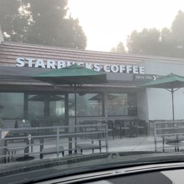 Exterior outside entrance of Starbucks - As of 09/28/22, they've moved all tables and seating to outside their cafe. - Huntington Beach, California Exterior outside entrance of Starbucks - As of 09/28/22, they've moved all tables and seating to outside their cafe. - Huntington Beach, California