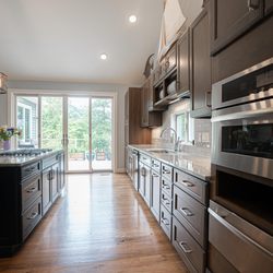 Landmark Surfaces - Alexandria - Kitchen Remodeled With Cooking & Dinning Space, Big Cabinet Space With Sink