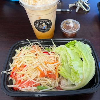 Thai Village House - BLAND Thai papaya salad not as pictured in other photos, browning lettuce wedges, light flavored Thai tea, small sized cup for $5.00 - Thai Near Me - Penryn, California Thai Village House - BLAND Thai papaya salad not as pictured in other photos, browning lettuce wedges, light flavored Thai tea, small sized cup for $5.00 - Thai Near Me - Penryn, California
