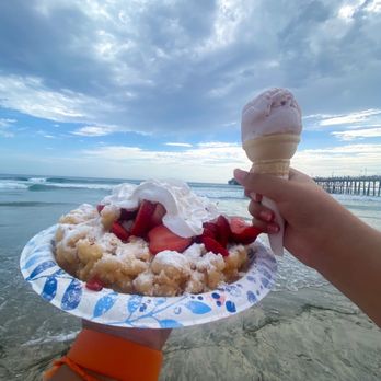 Mariposa Ice Cream - Oceanside - Small scoop of strawberry ice cream and funnel cake from the space next to Mariposa ice cream - Ice Cream & Frozen Yogurt Near Me - Oceanside, California Mariposa Ice Cream - Oceanside - Small scoop of strawberry ice cream and funnel cake from the space next to Mariposa ice cream - Ice Cream & Frozen Yogurt Near Me - Oceanside, California