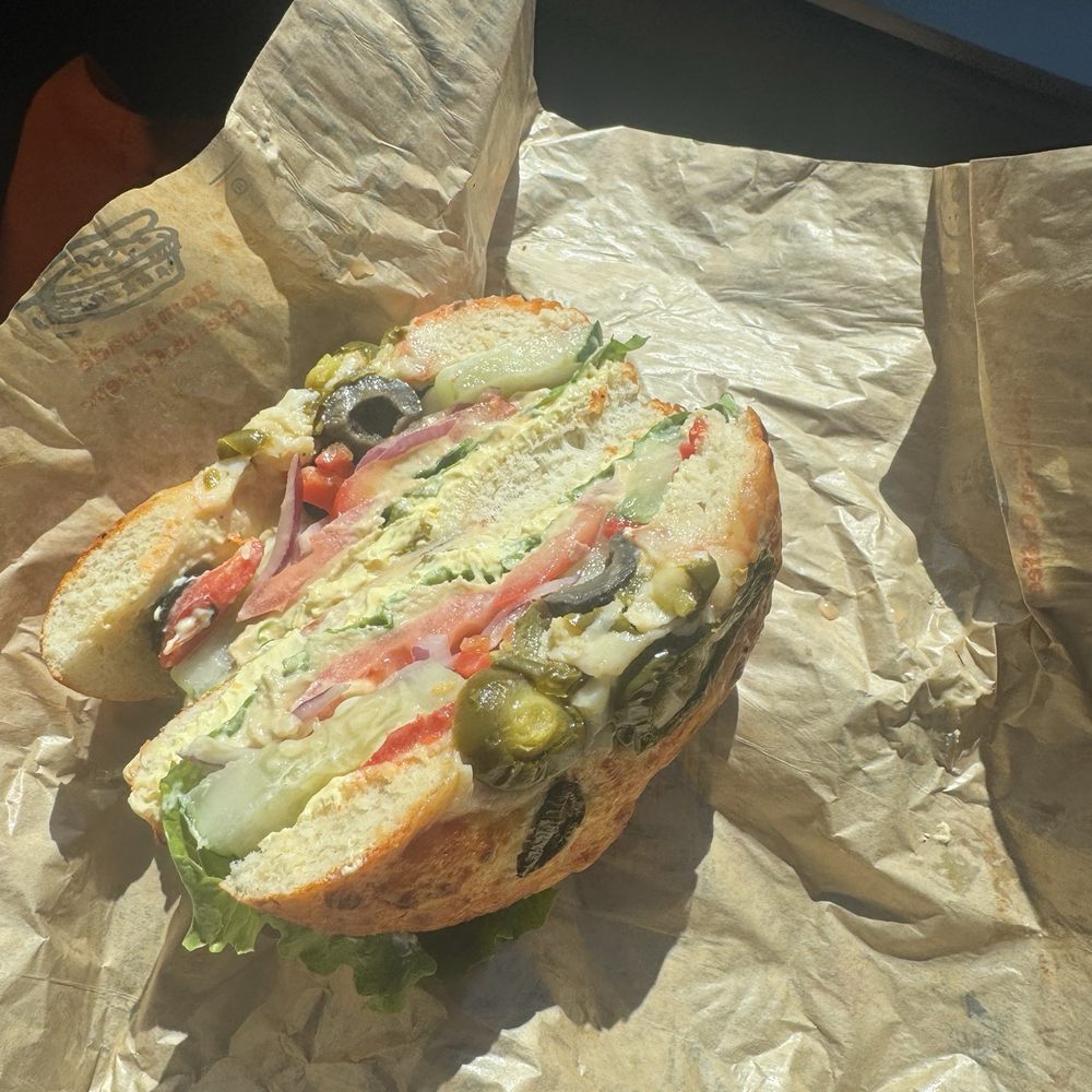 The Great American Bagel - Mediterranean veggie sandwich on Hot tomazzo bagel with jalapeño cheddar cream cheese - Bagels Near Me - St. John, Indiana The Great American Bagel - Mediterranean veggie sandwich on Hot tomazzo bagel with jalapeño cheddar cream cheese - Bagels Near Me - St. John, Indiana